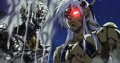 La periodista Sybel encara al cyborg M-66 entre chispas y humo en una escena de Black Magic M-66 (1987).