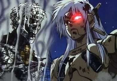 La periodista Sybel encara al cyborg M-66 entre chispas y humo en una escena de Black Magic M-66 (1987).