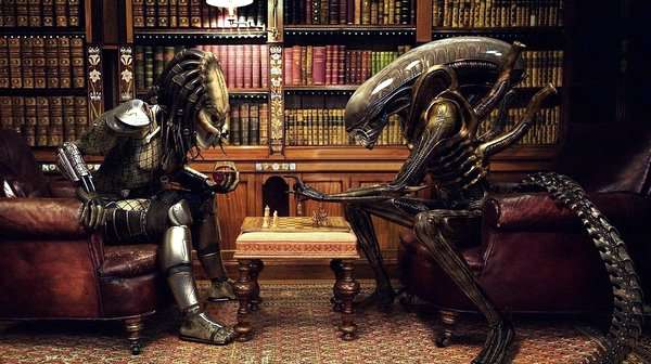 Top 10 juegos de Predator: los mejores títulos de la franquicia Alien y Predator jugando una partida de ajedrez en una imagen humorística.