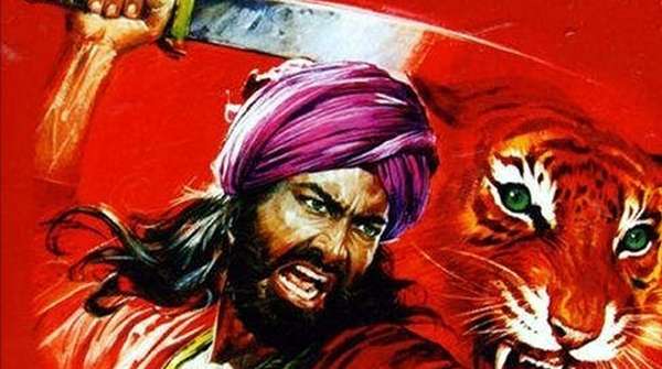 Sandokan junto a un tigre en ilustración clásica del personaje de Salgari
