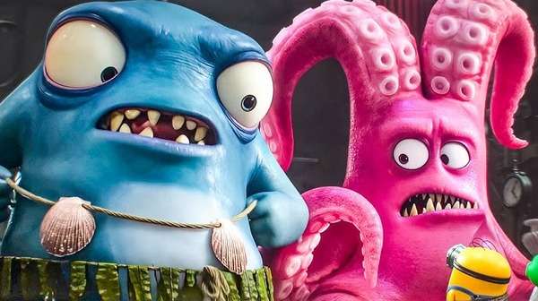 Los Minions enfrentan a dos monstruos gigantes en una escena de la película Minions y Monstruos.